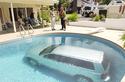 SUV in a pool.